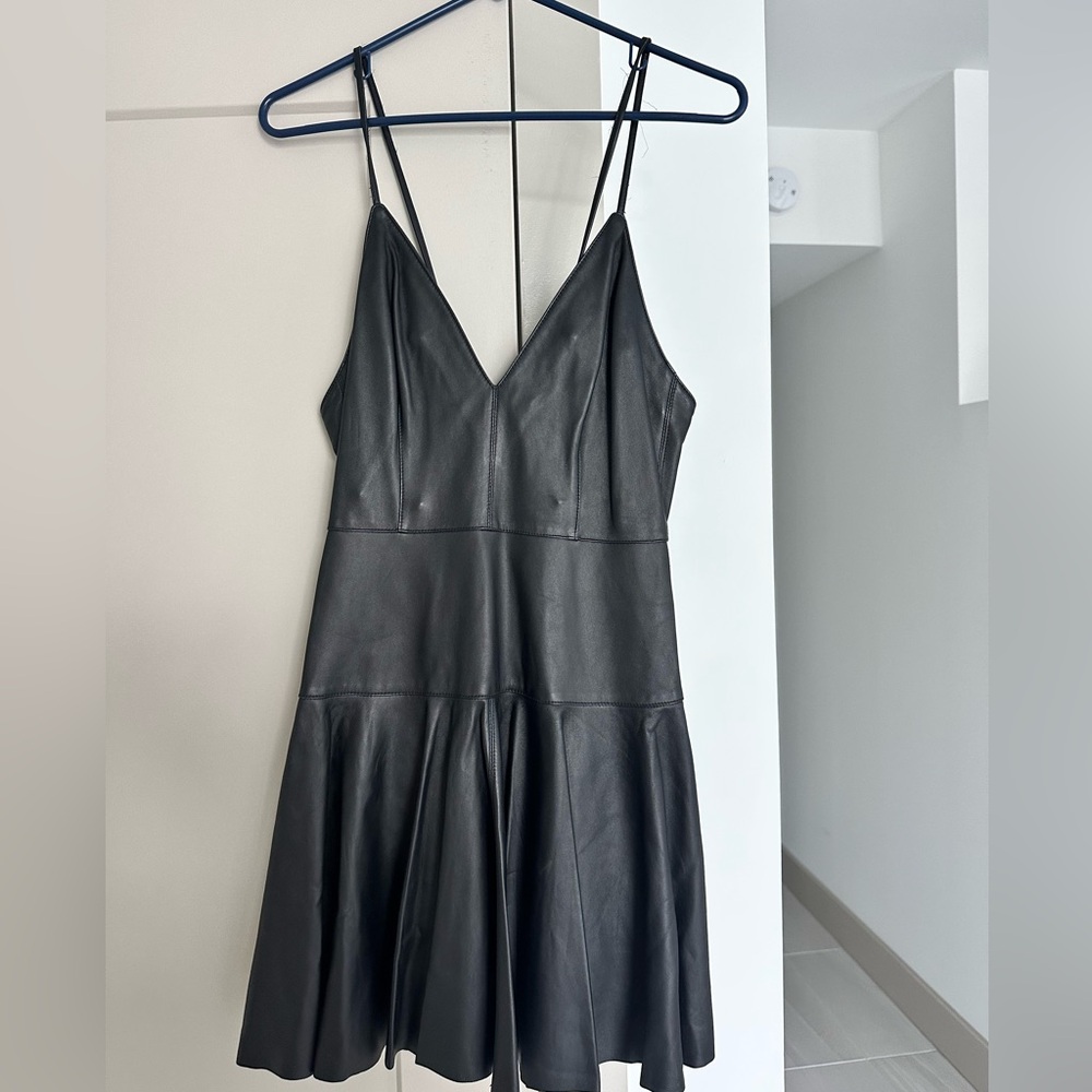 HOTTEST leather mini dress with pleated bottom